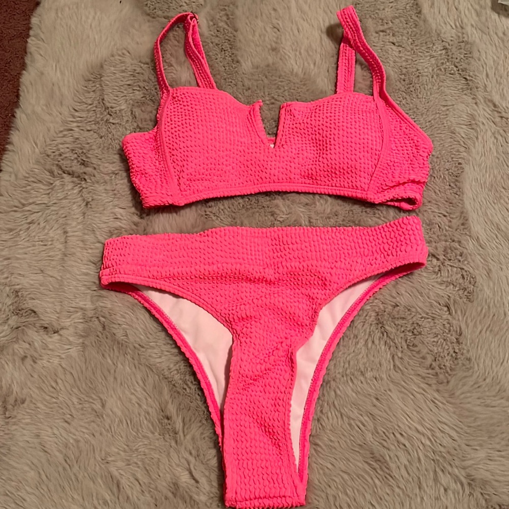 Neon pink swimsuit